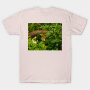 Vibrant Serenity: Orange Butterflies on Green Leaves T-Shirt